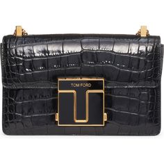 Find TOM FORD Croc Embossed Leather Shoulder Bag on Editorialist. This structured shoulder bag is crafted of glossy croc-embossed calfskin. It features an oversized T-clasp, a pull-through chain-and-leather strap, an exterior slip pocket, an interior zip pocket, and a leather lining. The bag is made in Italy. It can be worn on the shoulder. Oversized Handbags, Structured Shoulder, Ford Logo, Tom Ford Handbags, Croc Leather, Small Shoulder Bag, Chain Shoulder Bag, Black Bag, Embossed Leather