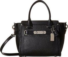 Coach 37444 Swagger 21 Pebble Leather Satchel Carryall Bag Black, new with tags. Bright color lends the Swagger 21 a pretty sophistication for spring. This charmingly petite version of a coveted silhouette is finished by hand in plump pebble leather with polished hardware, and a long strap that snaps on with ease for hands-free wear. * SV/Black color * Beautiful Coach black color pebble leather with silver color hardware * Measures approximately 8" (L) x 6.5" (H) x 4" (W) - bottom measures about Wedding Clutch Purse, Pink Shoulder Bags, Black Leather Satchel, Leather Coach, Coach Swagger, Carry All Bag, Satchel Handbags, Coach Swagger Bag, Shoulder Tote Bag