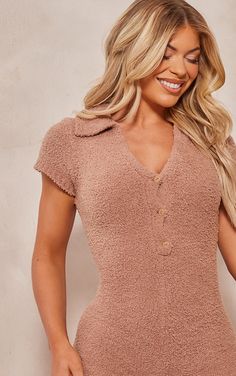 Bring all the cosy feels to your chilled day wardrobe with this brown teddy knit playsuit. Its brown teddy knit material is seriously comfy and with a figure-hugging fit, you really can't go wrong. This knit playsuit features short sleeves and a button down front for extra detailing, what more could you need? Style with slip on shoes and your go-to accessories to complete the look we're loving. Length approx 79cm/31inch (Based on a sample size S) Model wears size S Model Height - 5ft 5inchModel Height - 5ft 5inchp]:!mb-0inch>Category: KnitwearProduct type: PlaysuitColour: BrownDesign: PlainOccasion: Day Knitting Materials, S Models, Model Height, Playsuit, On Shoes, You Really, Slip On Shoes, Winter Fashion, Knitwear