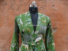 Please MESSAGE US for Wholesale Custom Order Product: 1 PC Printed Cotton kantha Quilted Jacket with belt Cotton Jacket made From Hand block Printed Kantha Quilt.It is hand Stitched fabric using natural dyes Measurements or Sizes: Length- 31 Inches, Bust-46 inches , Sleeve-28 inches Size: Free Size Jacket Color: Multi-color as Shown in Image. (refer to photos for all view angle) Note: Photos are taken in Natural Background. No editing is done uploading Photos. If you have any inquiry feel free t Festive Green Long Sleeve Kimono, Festive Green Long Sleeve Blazer, Fitted Bohemian Long Sleeve Blazer, Fitted Long Sleeve Green Kimono, Traditional Handmade Multicolor Outerwear, Indian Quilted Jacket, Kantha Kimono Jacket, Traditional Patchwork Cotton Outerwear, Traditional Multicolor Ikat Print Kimono