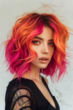 A bold wavy bob with bright, vibrant hair color accents stands out with its colorful and eye-catching look. This hairstyle is perfect for those who want to make a statement and express their individuality.