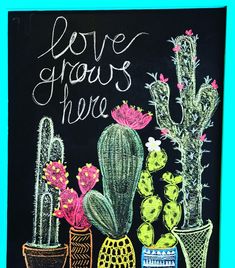 a chalkboard drawing of cacti and succulents with the words love grows here written on it