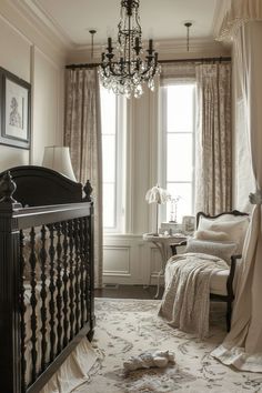 a baby's room with a crib, chandelier and bed in it