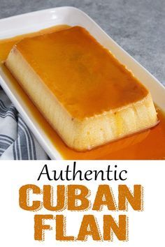 a white plate topped with a piece of cake covered in caramel sauce and the words authentic cuban flan