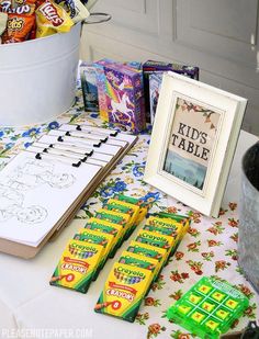 a table topped with candy bars and candies