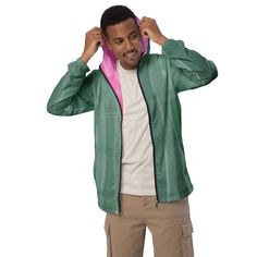 This lightweight windbreaker ensures maximum comfort on windy, rainy, and sunny days, thanks to the water-resistant fabric and breathable mesh lining. The windbreaker has an effortless look that will fit different styles and can be easily layered with long and short sleeve shirts.  * 100% polyester * Fabric weight: 2.21 oz/yd² (75 g/m²) * Lightweight, water-resistant fabric * Breathable mesh lining, reduces static * Regular fit * Elastic cuffs * Hood and side pockets * Zippable front * Blank pro Pink Nylon Hooded Jacket With Long Sleeves, Pink Long Sleeve Nylon Hooded Jacket, Functional Green Nylon Raincoat, Green Waterproof Raincoat For Sports, Green Waterproof Sports Raincoat, Sporty Green Waterproof Windbreaker, Green Nylon Windbreaker With Moisture-wicking, Green Nylon Windbreaker For Outdoor, Green Waterproof Windbreaker For Spring