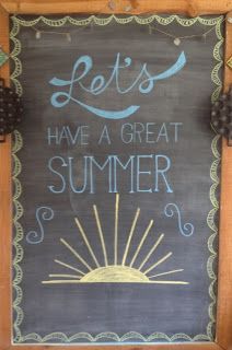 a chalkboard with the words let's have a great summer written on it