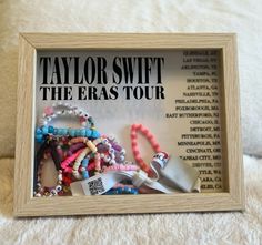 a wooden frame with some bracelets on it