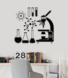 a wall decal with an image of a microscope and flasks