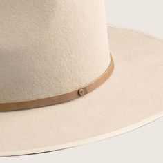 Inspired by the classic outback fedora with a simpler aesthetic. The Andy is our strongest statement piece yet, featuring a size adjustable sweatband designed to suit varied head sizes, a tall teardrop-shaped crown, a wide brim with a grosgrain binding to protect the brim edge. Made from stiffened cream Australian wool. Felt Sun, Baker Boy Cap, Travel Hat, Wide Brim Fedora, Wool Fedora, Simple Aesthetic, Dad Caps, Beautiful Hats, Fedora Hat