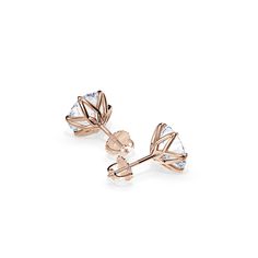 3 Carat Lab Grown Diamond Lotus Flower Stud Earrings ⍟ The price is for a pair of earrings. ★ Settings ☆ Metal - 14K / 18K Solid Gold ☆ Gold Color - Rose / White / Yellow ★ Main Stones ☆ Type - Lab Grown Diamond (CVD) ☆ Diamond Weight - 3 Carat Total / 2pcs of 1.5ct  ☆ Shape - Round Brilliant ☆ Color - F+ ☆ Clarity - VS1+ ☆ Polish/Symmetry/Cut - Ex/Ex/Ex ☆ Fluorescence - None ☆ IGI / GIA Certificate ★ Features : ☆ 30-day Money-Back Guarantee. ☆ Handmade & Made to order. ☆ Ready to ship in 6-10 B Elegant Rose Gold Plug Earrings As Gift, Elegant Rose Gold Plug Earrings For Gift, Rose Gold Pierced Flower Earrings For Formal Occasions, Rose Gold Flower Earrings For Formal Events, Gia Certificate, Cvd Diamond, Flower Stud, Jewelry Ring Box, Earrings Minimalist