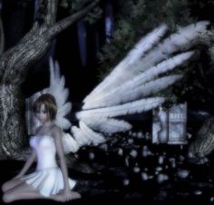 an angel sitting on the ground in front of some trees