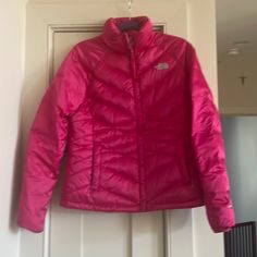 This The North Face Pink Puffer Jacket Has Only Been Used Once And Is In Pristine Condition. At Least 75% Goose Down As Shown In Tag. Size Medium. No Stains Or Wear Marks Armpit To Armpit 21”. Armpit To Bottom Of Garment 21” And Armpit To Bottom Of Garment 15”. Two External Pockets The North Face Puffer Jacket Pink, Pink Puffer Jacket, The North Face Jackets, North Face Jackets, North Face Jacket, Puffer Jacket, North Face, The North Face, Puffer