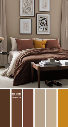 a bedroom with brown and tan colors on the walls, pictures above the bed and below the bed is a coffee table