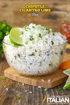 white rice in a bowl with limes and cilantro garnishes