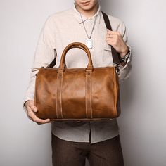 Timeless leather bags designed for professionals. Ideal for business trips, combining classic charm with modern functionality. Free Shipping on All Leather Duffle Bags Material Explanation: Made from natural first layer cowhide, showcasing unique textures, minor scratches, creases, and skin spots. These natural variations are not defects but characteristics of authentic leather. About Crazy Horse Leather: Initial use may result in a slight color transfer. It’s recommended to avoid pairing with light-colored clothing until the leather surface becomes brighter. Scratches and creases can be minimized or removed by gently rubbing with your hand. Regular oil care can enhance the leather's appearance over time. Maintenance Instructions: Avoid water exposure. If leather gets wet, dry promptly wit Travel Bag Men, Leather Business Bag, Business Travel Bag, Leather Duffel Bag, Leather Toiletry Bag, Real Leather Bags, Cowhide Bag, Bags Leather Handbags, Leather Duffle Bag