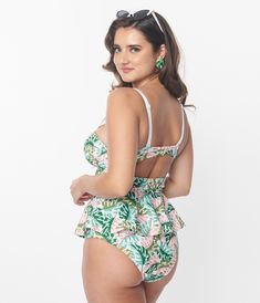 This plus size tankini swim top dances with a print of monstera leaves in shades of green and pink throughout the white backdrop. Outfitted with molded padding, underwire, hook back, adjustable straps and a darling peplum flare. Bottom Sold Separately.Available in sizes XS-3X while supplies last. Fitted Tropical Tankini With Adjustable Straps, White Tropical Swimwear With Adjustable Straps, Pink Monstera, Plus Size Tankini, Monstera Leaves, Tankini Swim Tops, Swim Tankini, White Backdrop, Green And Pink