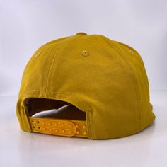 Ready to ship Do you like Wonderwall? Are you an icon? If not, this amazing yellow Oasis hat will make you one. The Snapback allows you to adjust the hat size to fit many different people comfortbly. Yellow Baseball Cap With Embroidered Logo, Yellow Curved Brim Baseball Cap With Embroidered Logo, Yellow Cotton Dad Hat, Yellow Cotton Trucker Hat With Curved Brim, Yellow Cotton Dad Hat With Curved Brim, Yellow Cotton Trucker Hat, Yellow Cotton Curved Brim Dad Hat, Yellow Snapback Hat With Embroidered Logo, Yellow Cotton Snapback Baseball Cap