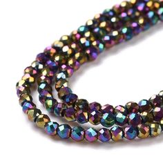 three strands of multicolored glass beads