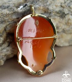 "Brand: M+M Scognamiglio Metal: 14k Yellow Gold (.585) Weight: 7.2 grams Measurements: 1.5\" Long; 1\" Wide Markings: 14K 585 Italy *Delicately hand-carved, this beautiful carnelian shell cameo pendant / brooch features an image of a beautiful lady facing right with her flowing hair held back by a floral headband. The cameo of the woman is set in a lovely 14k yellow gold bezel that really accentuates the wondrous carving. This outstanding Victorian cameo is in great condition, with light wear. T Orange Brooch Jewelry For Formal Occasions, Formal Orange Brooch Jewelry, Formal Cameo Carnelian Jewelry, Formal Cameo Jewelry In Carnelian, Formal Carnelian Cameo Jewelry, Yellow Gold Carnelian Wedding Jewelry, Gold Floral Headband, Victorian Cameo, Flowing Hair