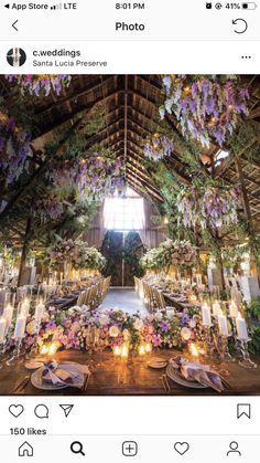 an instagram page with candles and flowers on the table, surrounded by greenery