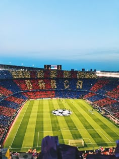 an empty soccer stadium filled with lots of people