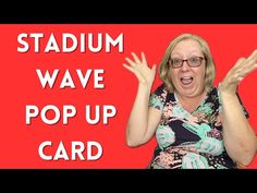 a woman is holding her hands up in front of the words stadium wave pop up card