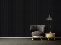 a chair and table in front of a black wall with vertical stripes on the wall