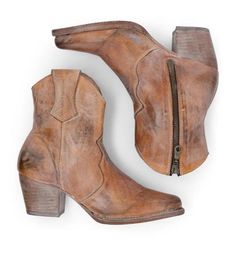 At first glance, the Baila Cowgirl Boots in Rustic look like authentic footwear from centuries past. Although they possess a distinct sense of vintage charm, details like zipper closure makes them comfortable and versatile enough for any contemporary fashionista. These boots pair perfectly with any aesthetic, meaning they’ll add fashionable flair to every single one of your favorite looks. Fabric Rich, hand finished vegetable tanned leather. Goodyear welted leather outsole, leather wrapped heel. Ankle Cowgirl Boots, Combat Boots Shorts, Apricot Heels, Short Cowboy Boots, Popular Boots, Womens Chunky Heels, Wrap Heels, Thick Heel, Green Beige