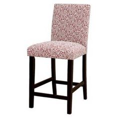 a black and white chair with an upholstered pattern on the backrests