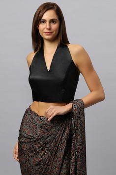 Product Features: Color: Black Material: Satin Silk Neck Line: Halter Tie Back Closure: Neck & Back Tie Care: Dry Clean Only & Steam Iron Occasion: Beach Wear, Resort Wear, Cocktail Party, Festive Wear Product Type: Blouse, Crop top Black Crop Top With Saree, Black Halter Neck Blouse, Modal Silk Blouse Design, Halter Neck Blouse Design, Blouses Pattern, Ajrakh Pattern