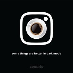 a cup of coffee sitting on top of a white and black square frame with the words, some things are better in dark mode