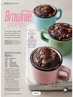 two mugs filled with brownies sitting on top of a white counter next to each other