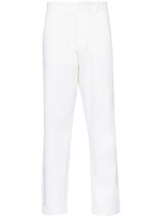 white cotton twill weave enamel triangle logo to the rear belt loops at the waist five-pocket design tapered leg front hook and zip fly fastening White Chinos For Workwear, White Straight Pants With Belt Loops, White Straight Leg Bottoms With Belt Loops, Classic White Pants With Belt Loops, White High-waisted Pants With Five Pockets, Modern White Trousers, White Tapered Leg Chinos For Spring, White Chinos With Straight Hem For Spring, Modern White Pants With Five Pockets