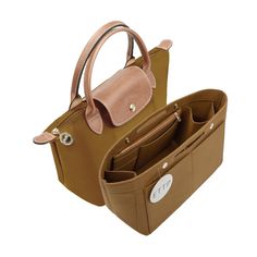 two purses are sitting next to each other on a white surface, one is brown and the other is tan