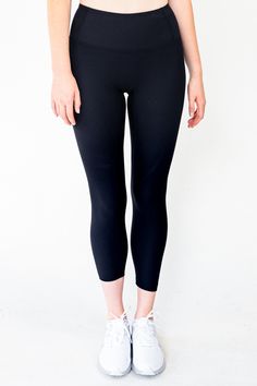 The Linear Legging in Black combines fashion and function, with a 4-way stretch ribbed fabric that is breathable, quick-drying, and moisture-wicking for a comfortable fit. The wide waistband provides tummy control and a flattering silhouette, while the triangle-shaped crotch allows for deep squats. The ribbed, non-slip design keeps the legging securely in place during any workout. Achieve both comfort and style in the Linear Legging.ra. Material: 69% Nylon & 31% Spandex GSM: 220G Model is 5'11" and wears a size M Black Compression Pants With 5-inch Inseam, Fitted Yoga Pants With 5-inch Inseam, Compressive Bottoms For Running With 5-inch Inseam, Gym Leggings With 4-way Stretch In Recycled Polyester, Black 4-way Stretch Leggings For Sports, Elastane Activewear With Wide Waistband, High Waist Go-dry Stretch Bottoms, High Waist 4-way Stretch Training Bottoms, Functional Activewear With 4-way Stretch