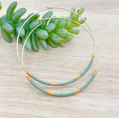 Sea green hoop earrings, boho hoop earrings, beaded hoop earrings, dainty bead hoop earrings, dangle gold earrings, big hoop earrings, hoop earrings, gold hoop, statement hoop earrings, boho dangle hoop These lightweight hoop earrings are so chic to show off your style by wearing them with your hair tucked or low in bun. They are perfect for daily wear in the office or a night on the town.  Perfect gifts for all feminis ❤️ Earrings are enlarge to show details and colors might vary depend on each Green Hoop Earrings With Tiny Beads, Minimalist Small Hoop Beaded Earrings For Everyday, Green Dangle Hoop Earrings With Tiny Beads, Green Small Hoop Earrings With Tiny Beads, Green Tiny Beads Small Hoop Jewelry, Green Small Hoop Jewelry With Tiny Beads, Everyday Minimalist Beaded Hoop Earrings, Green Beaded Hoop Earrings, Everyday Hoop Earrings With Tiny Beads