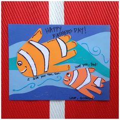 a card with an image of two clown fish on it and the words happy father's day