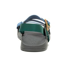 Men's Chaco Lowdown Sandal - Blue Green Meet the Lowdown, Chaco’s lightweight, low-profile sport sandal built for a travel-ready life on the go. Featuring just the essentials, like our iconic Z/Straps with cinch buckle for a truly customized fit, plus pull-through adjustment in the heel riser to maximize barefoot comfort. The Lowdown Sandal looks great dressed up or down and is engineered with high-rebound EVA and our contoured LUVSEAT™ arch-support for healthy alignment and all-day comfort unde Casual Slip-on Sport Sandals For Outdoor Activities, Casual Slip-on Sport Sandals For Outdoor, Casual Sport Sandals With Cushioned Footbed For Outdoor, Lightweight Casual Sport Sandals For Hiking, Sporty Slip-on Slides For Outdoor Activities, Casual Breathable Sport Sandals For Outdoor Activities, Comfortable Slip-on Sport Sandals For Outdoor Activities, Lightweight Sporty Sandals For Outdoor, Sporty Non-slip Slides For Outdoor