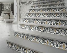 the stairs are decorated with black and white designs