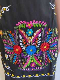 "Gorgeous floral machine embroidery kimono dress, for the perfect fit has ties on the back. The colors pop out It is the perfect summer dress Loose fit Fits size Small Measurements taken flat: Armpit to armpit 21 1/2\" Bottom hem width 23\" Shoulders to bottom hem 36 1/2\"" Bohemian Sundress With Floral Embroidery, Folk Style Floral Embroidered Beach Dress, Folk Style Embroidered Dress With Floral Embroidery For Beach, Folk Style Floral Embroidery Dress For Beach, Summer Festival Dress With Floral Embroidery, Multicolor Floral Embroidery Boho Dress, Beach Dress With Multicolor Floral Embroidery, Bohemian Spring Dress With Embroidered Border, Floral Embroidered Sundress For Vacation