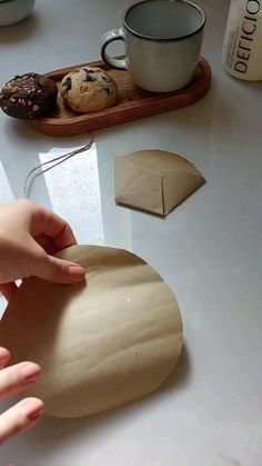 someone is making some cookies on the table