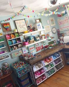 a room filled with lots of craft supplies