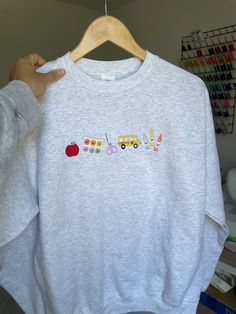 Embroidered Teacher Sweatshirt Back to School Teacher Sweatshirt for Teacher Gift, Classroom Apparel - Etsy Teacher Sweater Ideas, Early Childhood Teacher Outfits, Appropriate Teacher Outfits, Rainy Day Outfit Teacher, Outfits For Kindergarten Teachers, Fun Elementary Teacher Outfits, Teacher Shirt Outfit, Teacher Friday Outfit, Teachers Christmas Gifts