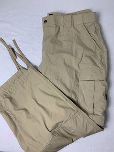 5.11 Tactical Series Capri Pants Size 3x (47.5-51) Material: cotton and polyester Color: tan bag 22r JN Beige Cargo Pants For Outdoor Activities, Beige Cargo Pants With Side Pockets For Outdoor Activities, Tactical Khaki Cargo Pants With Functional Pockets, Tan Bag, Capri Pants, Capri, Pants, How To Wear, Color