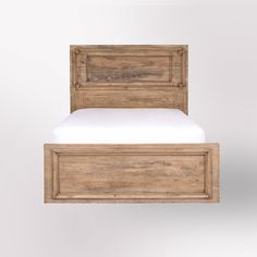 a wooden bed frame with two drawers on each side