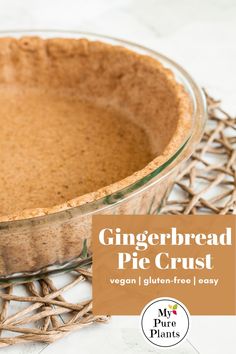 an uncooked pie crust in a glass dish on a wicker basket with the title gingerbread pie crust vegan gluchen - free easy