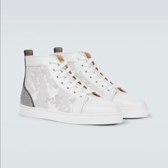 Detailed With An All-Over Perforated Design, The Classic Louis Sneakers From Christian Louboutin Are Reimagined In This High-Top Version Which Is Crafted From Leather With Suede Trims, And Comes In A Crisp White Colorway. Upper: Calf Leather, Goat Leather Lining: Leather Sole: Leather Insole, Rubber Sole Round Toe Lace-Up Made In Italy Sizes 11 And 11.5 Most Items Come From A Retail Store And May Have Been Tried On. They Can Occasionally Have Some Light Marks Or Stickers/Sticker Residue On The O Luxury White Custom Sneakers With Perforations, Designer High-top Sneakers With Perforations, Luxury White High-top Sneakers With Laces, Luxury Custom Lace-up Sneakers With Perforations, Luxury High-top Custom Sneakers With Perforations, Christian Louboutin Sneakers, Men's High Top Sneakers, Spike Shoes, Christian Louboutin Men