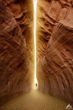 a person standing in the middle of a canyon with a quote about people take different roads, seeking fulfillment and happiness just because they're not on your road