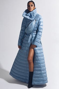 Luxury Nylon Outerwear For Cold Weather, Luxury Down Outerwear Functional Style, Luxury Puffy Outerwear For Winter, Luxury Long Blue Outerwear, Luxury Nylon Winter Outerwear, Luxury Winter Puffy Outerwear, Luxury Reflective Outerwear For Fall, Luxury Blue Hooded Parka, Womens Long Puffy Vest